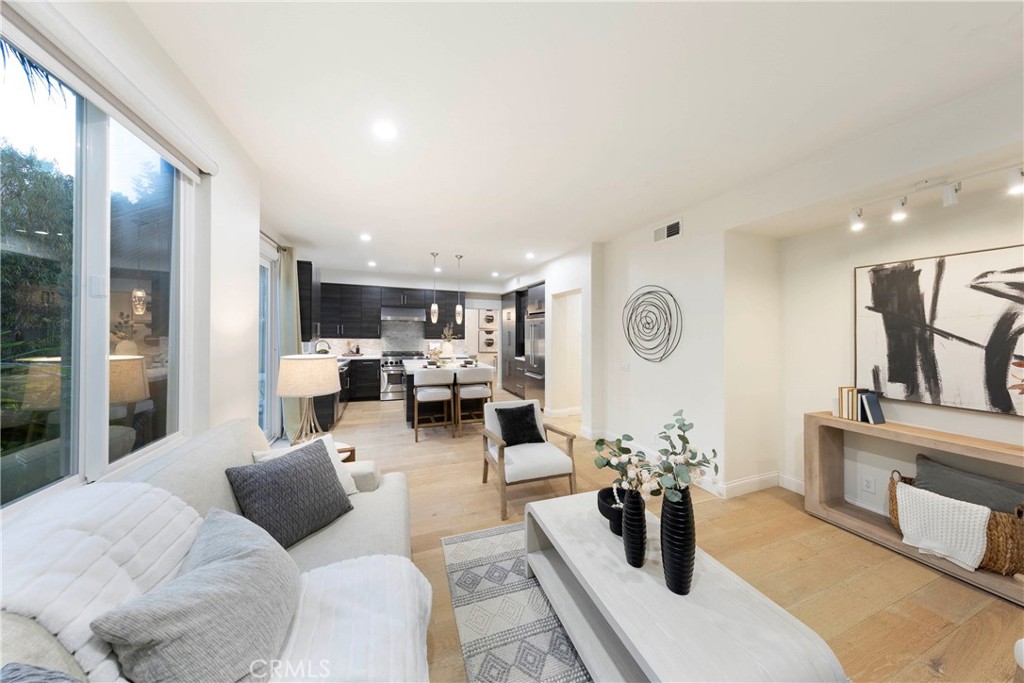 43 Lessay Newport Coast, CA 92657 - Photo 14 of 29 Kitchen overlooks spacious family room with access to beautifully maintained backyard.