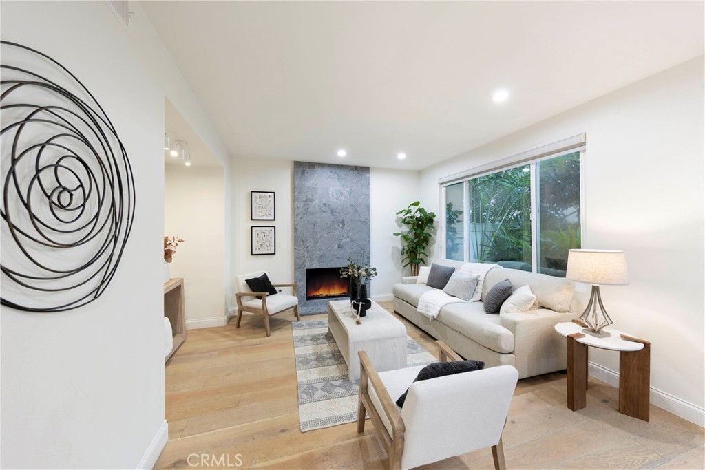 43 Lessay Newport Coast, CA 92657 - Photo 16 of 29 Kitchen overlooks spacious family room with access to beautifully maintained backyard.