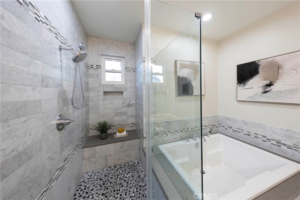 43 Lessay Newport Coast, CA 92657 - Photo 22 of 29 Primary remodeled ensuite bathroom with private toilet.