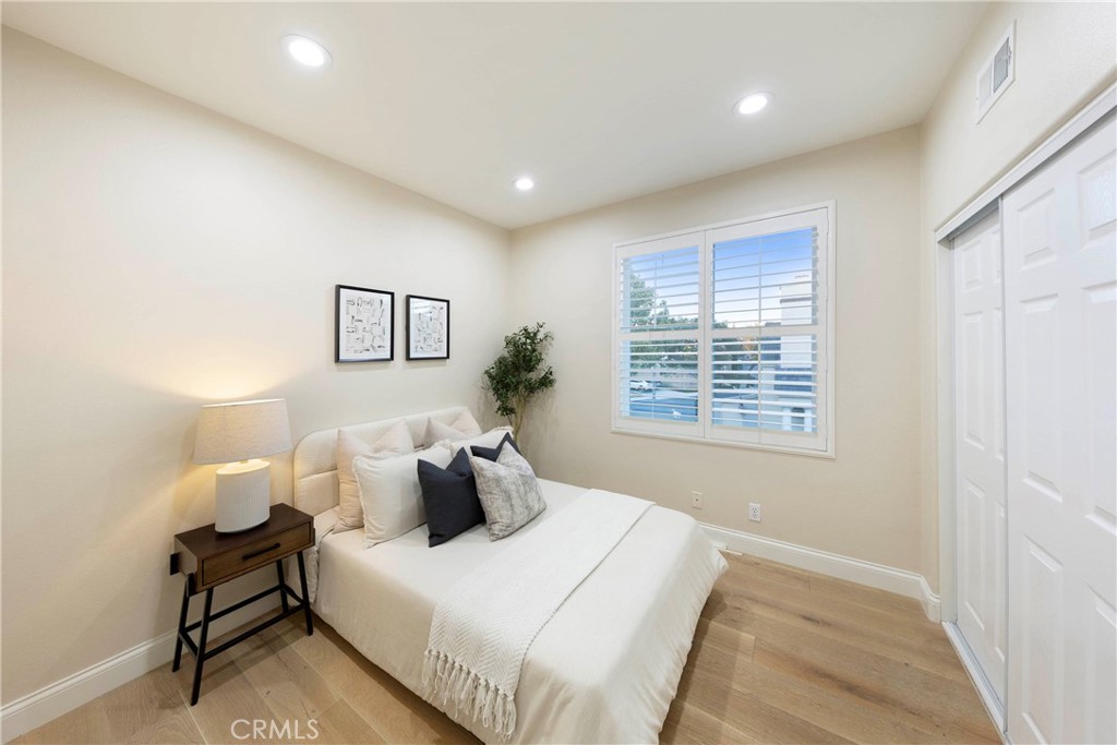 43 Lessay Newport Coast, CA 92657 - Photo 24 of 29 Secondary Upstairs bedroom featuring recessed lighting.