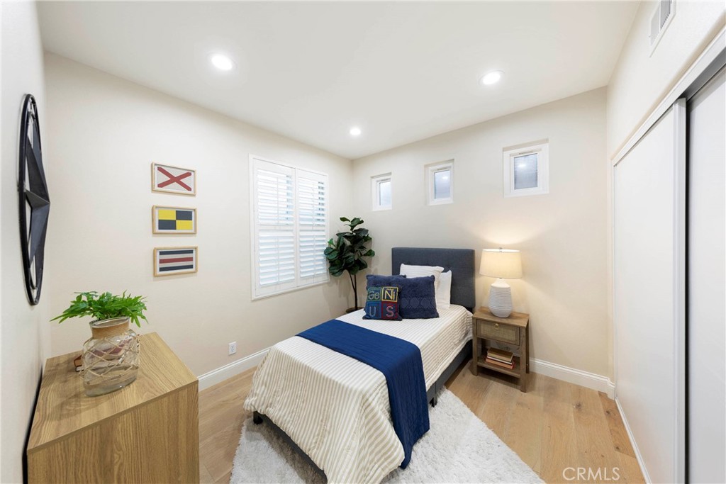 43 Lessay Newport Coast, CA 92657 - Photo 26 of 29 Secondary Upstairs bedroom featuring recessed lighting.