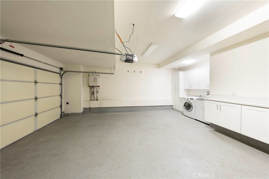 43 Lessay Newport Coast, CA 92657 - Photo 27 of 29 Spacious 2-car garage with built in storage.