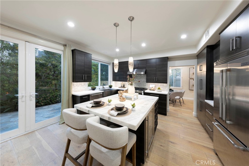 43 Lessay Newport Coast, CA 92657 - Photo 10 of 29 Remodeled kitchen boasting quality appliances and finishes.