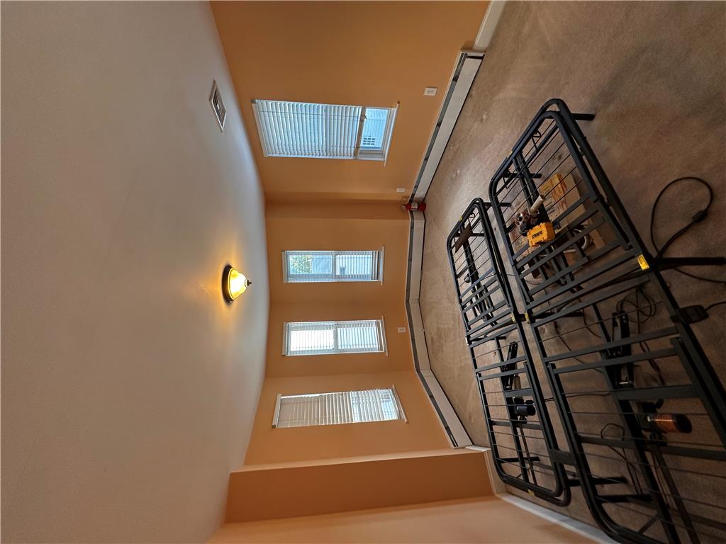 5128 3rd Street Whitehall, PA 18052 - Photo 24 of 26 Natural light streams into this generously sized living area, offering a tranquil retreat.