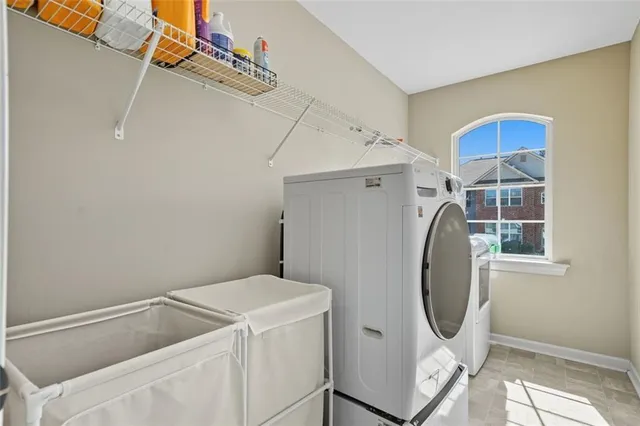 a utility room with dryer and washer
