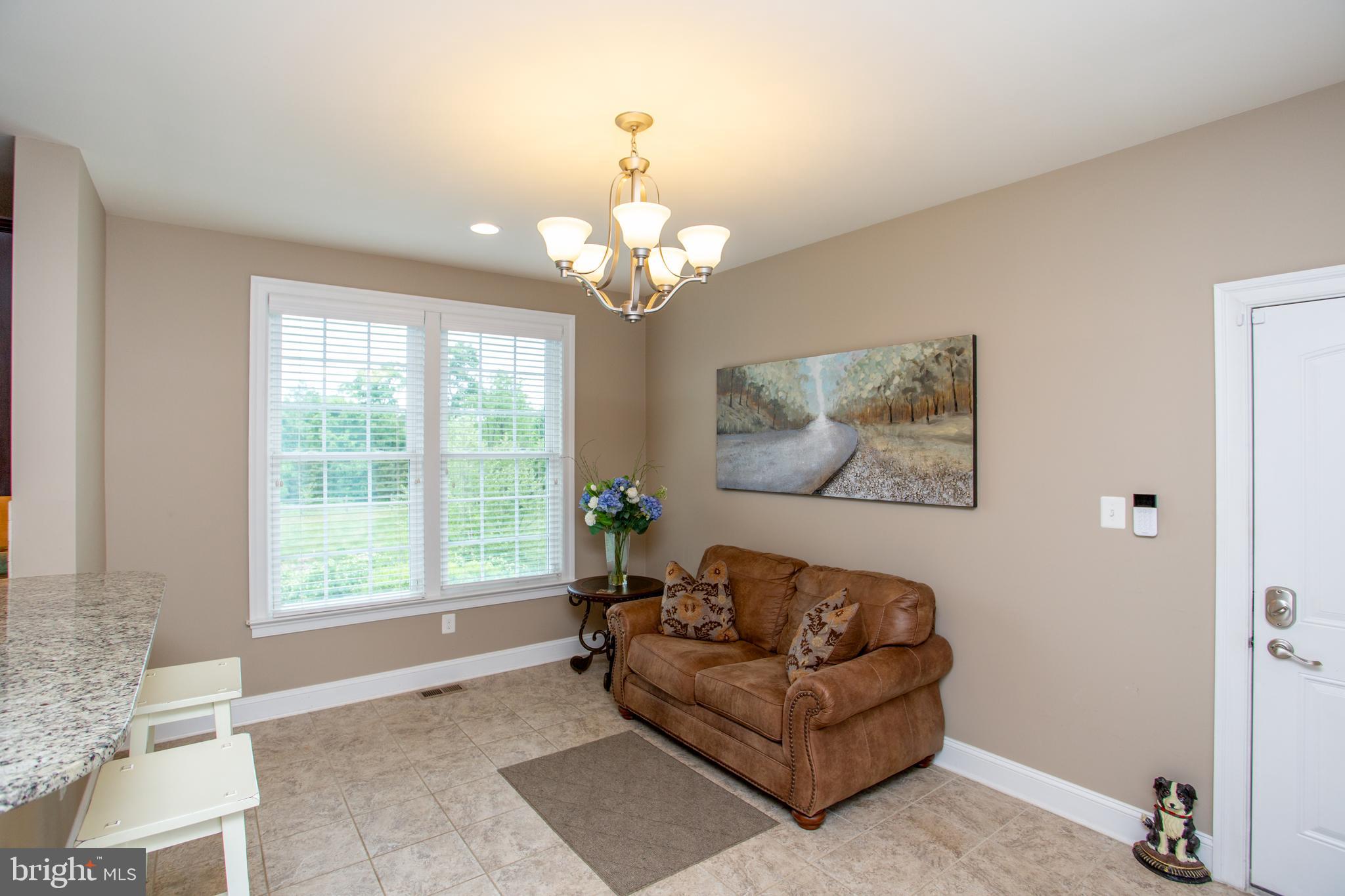 4682 Plough Tavern Road Doylestown, PA 18902 - Photo 18 of 42 a living room with furniture and a large window