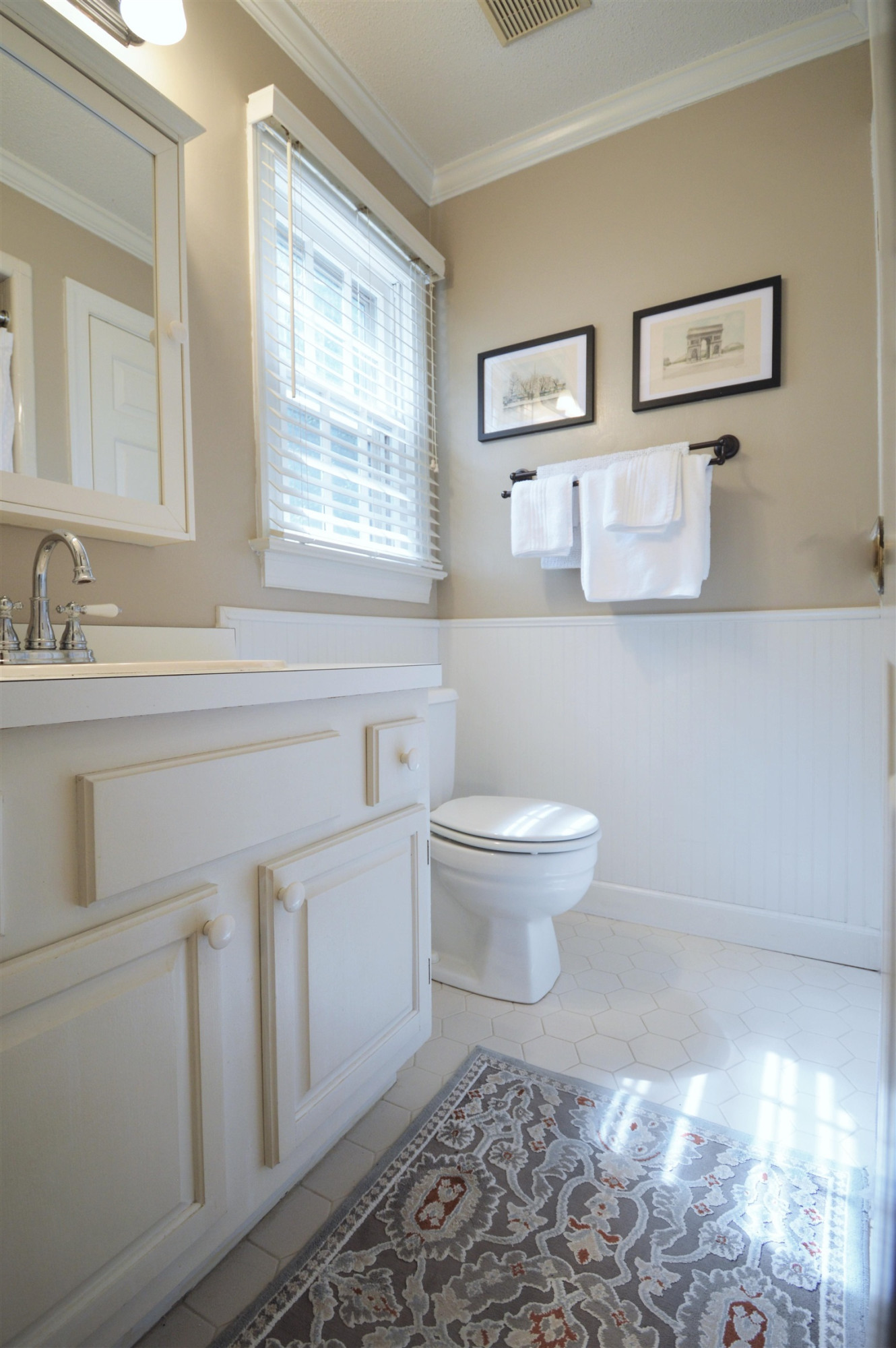 7008 Sandringham Drive Raleigh, NC 27613 - Photo 16 of 52 The bath has crown molding and ceramic tile flooring. The owner replaced the sink fixtures. Owner's Bath
