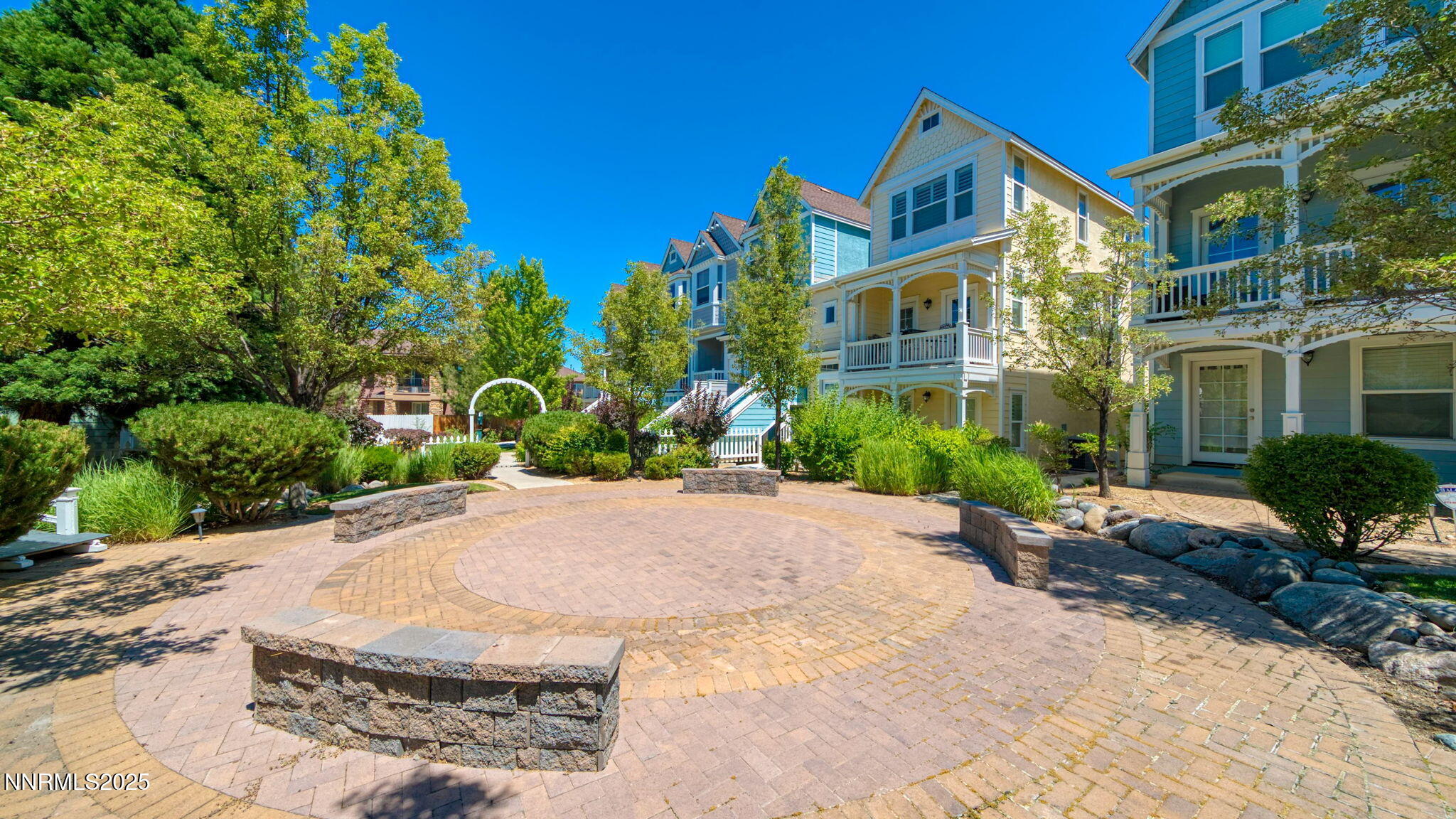 225 Gramercy Lane Reno, NV 89509 - Photo 2 of 40 a front view of a house with a garden