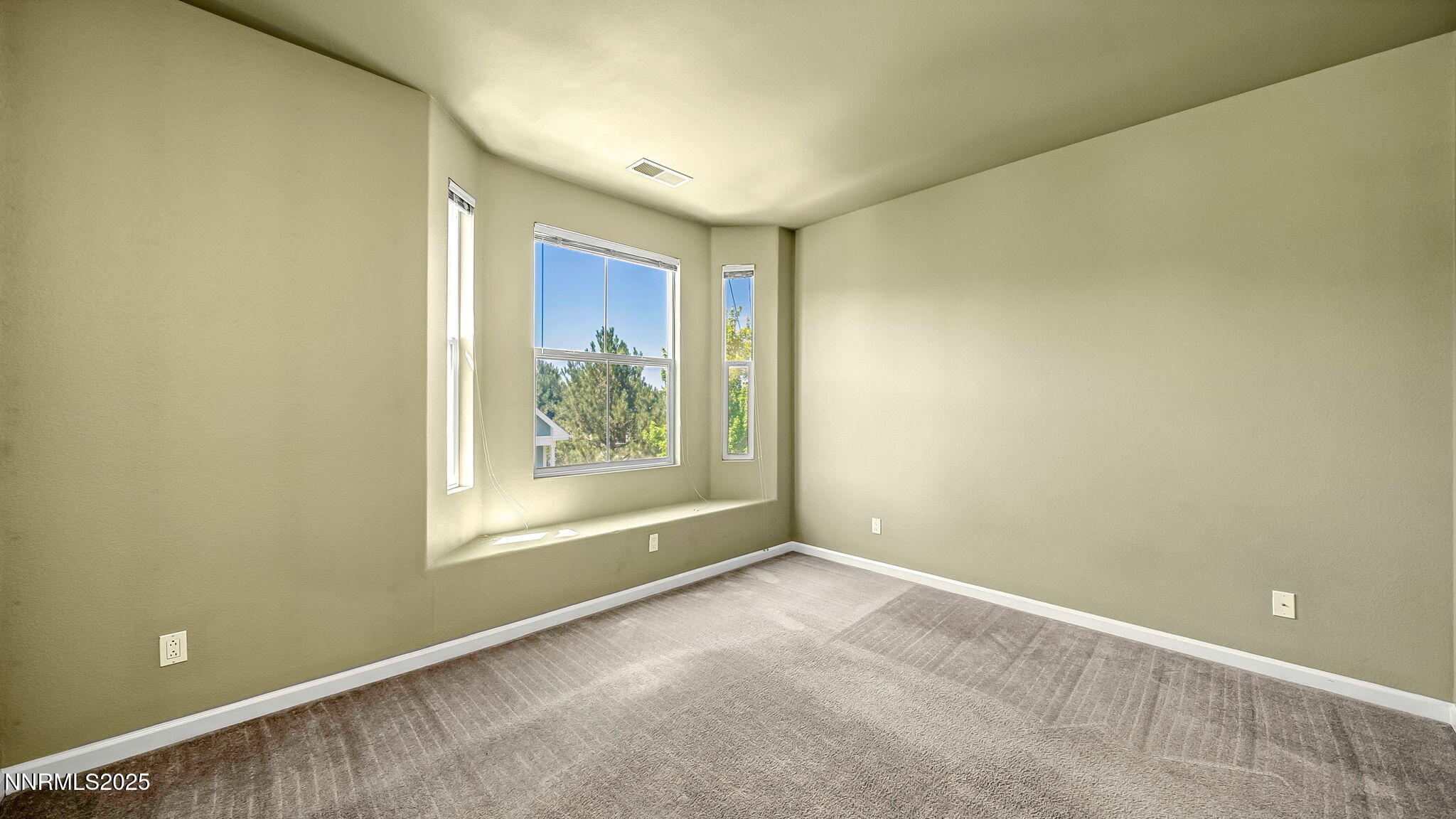 225 Gramercy Lane Reno, NV 89509 - Photo 21 of 40 a view of an empty room with a window