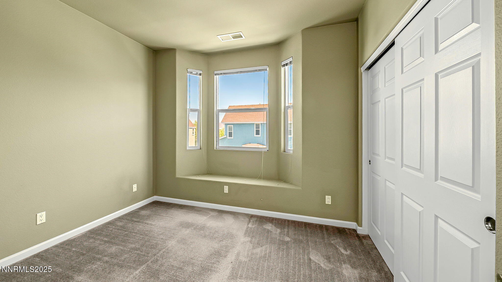 225 Gramercy Lane Reno, NV 89509 - Photo 34 of 40 a view of an empty room with a window