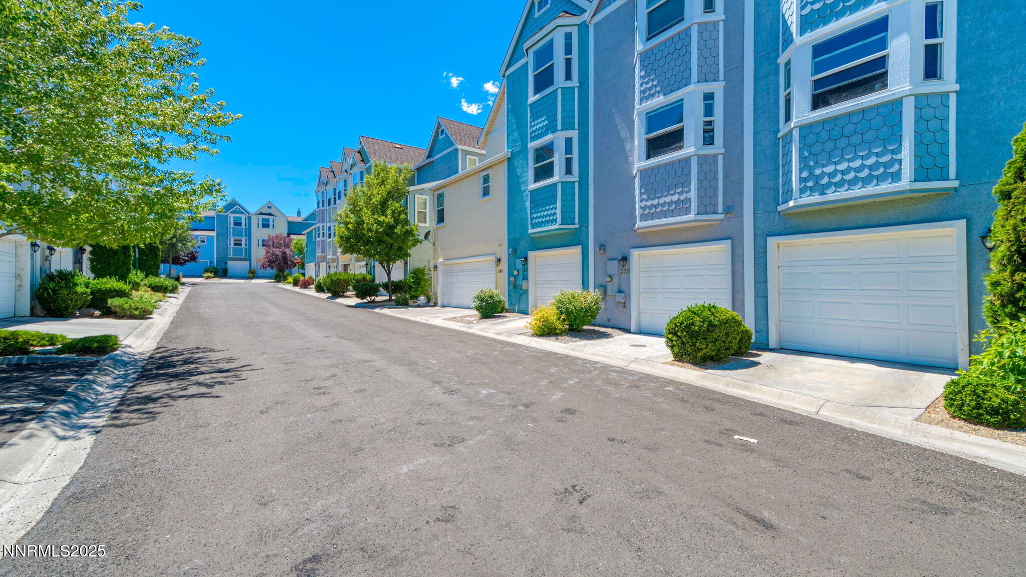 225 Gramercy Lane Reno, NV 89509 - Photo 6 of 40 a view of a brick building with a yard