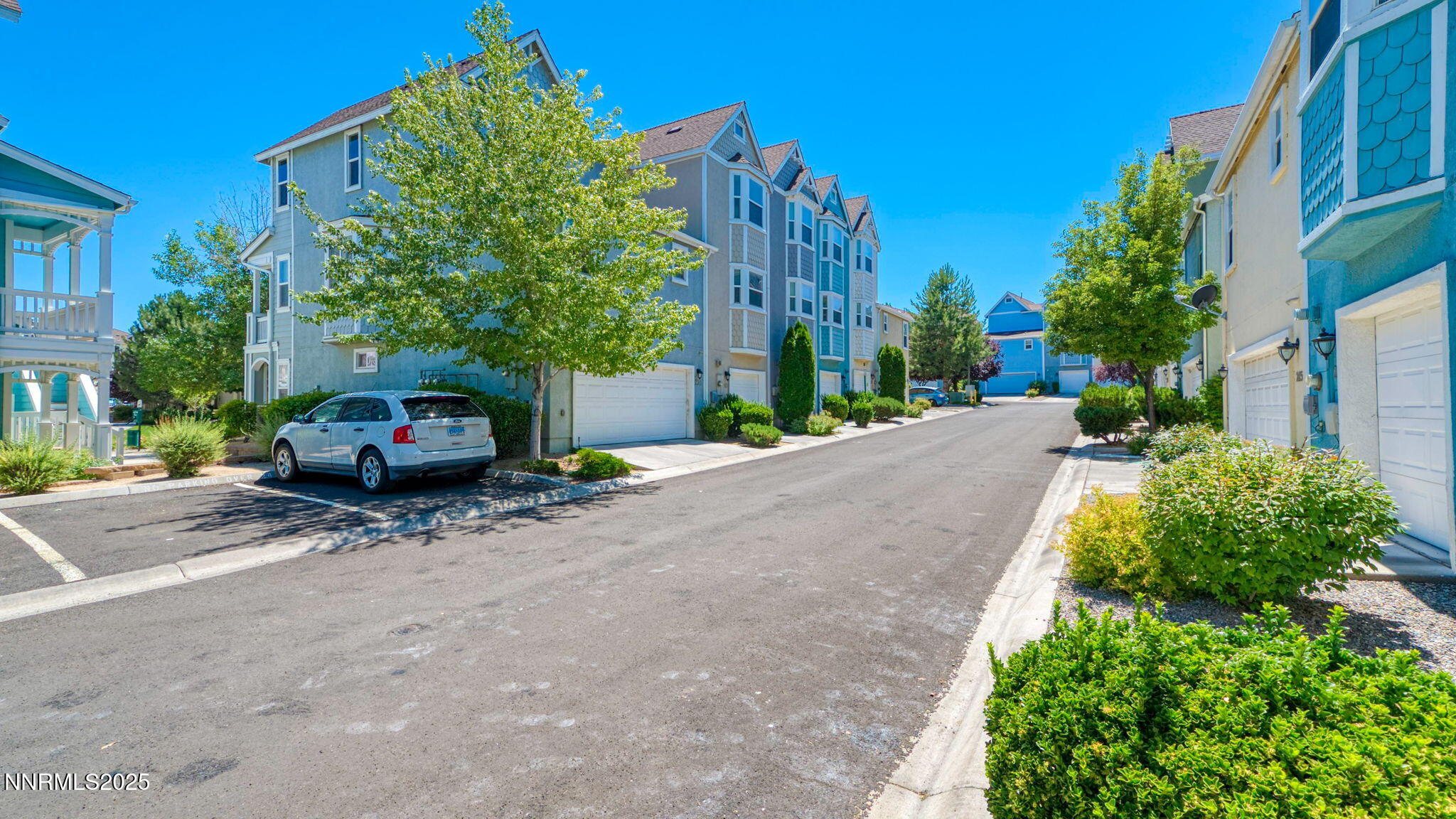 225 Gramercy Lane Reno, NV 89509 - Photo 7 of 40 a car parked on the side of a street
