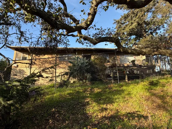 a view of swimming pool from a yard