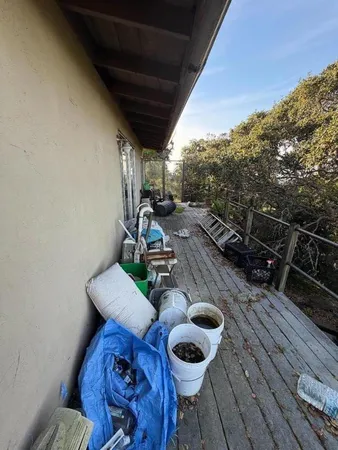 a view of backyard with seating space