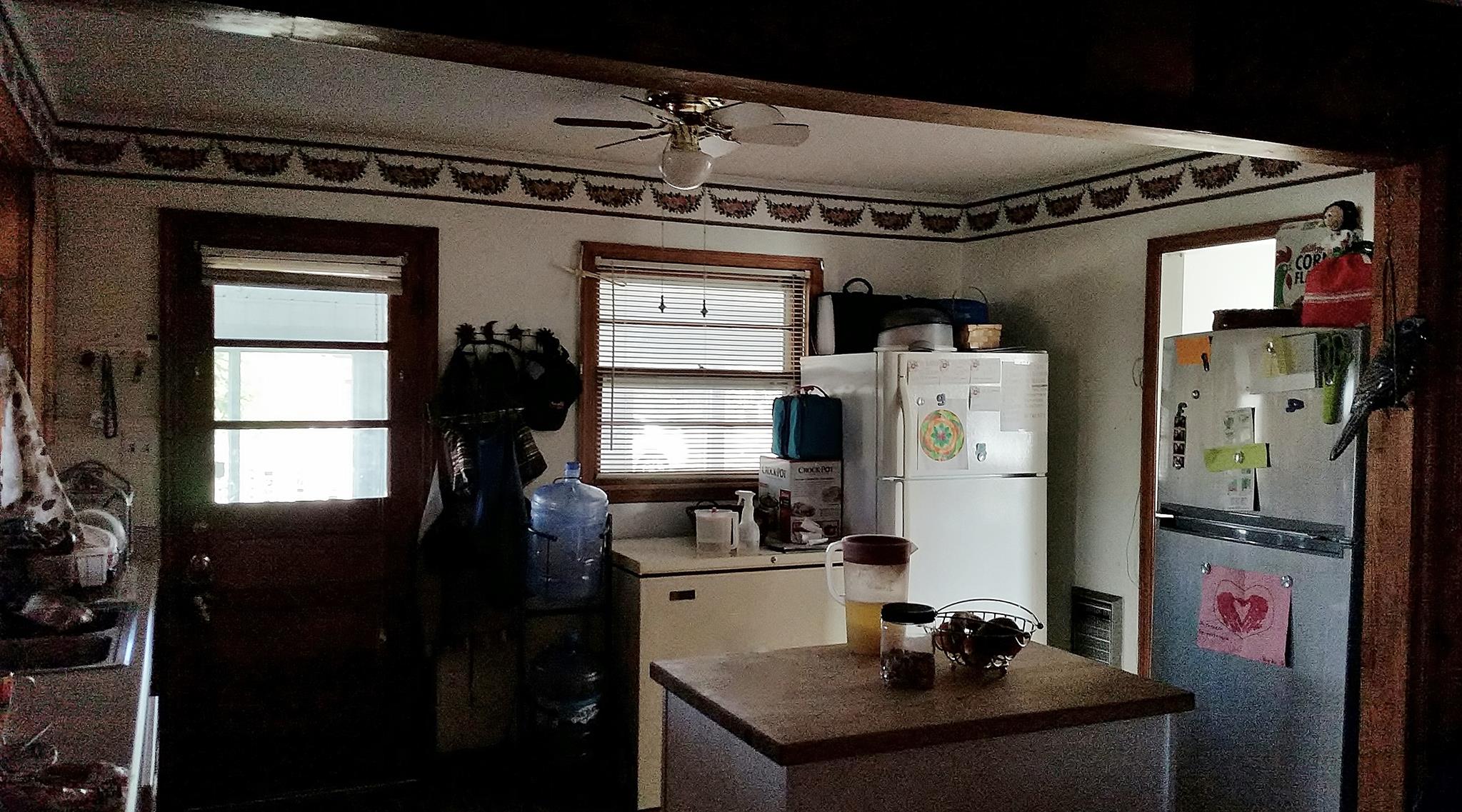910 Rackley Drive Pulaski, TN 38478 - Photo 6 of 11 Nice kitchen with island bar. Stove & Dishwasher remain.