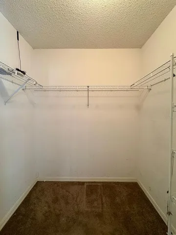 a bathroom with a shower and a bath tub