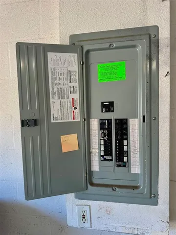 a view of a livingroom with a ceiling fan and window