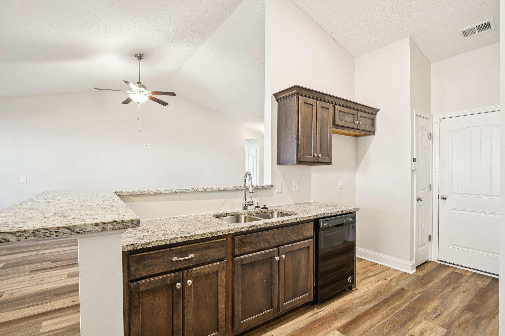 1030 Berra Drive Springfield, TN 37172 - Photo 4 of 13 a bathroom with a granite countertop sink vanity and mirror
