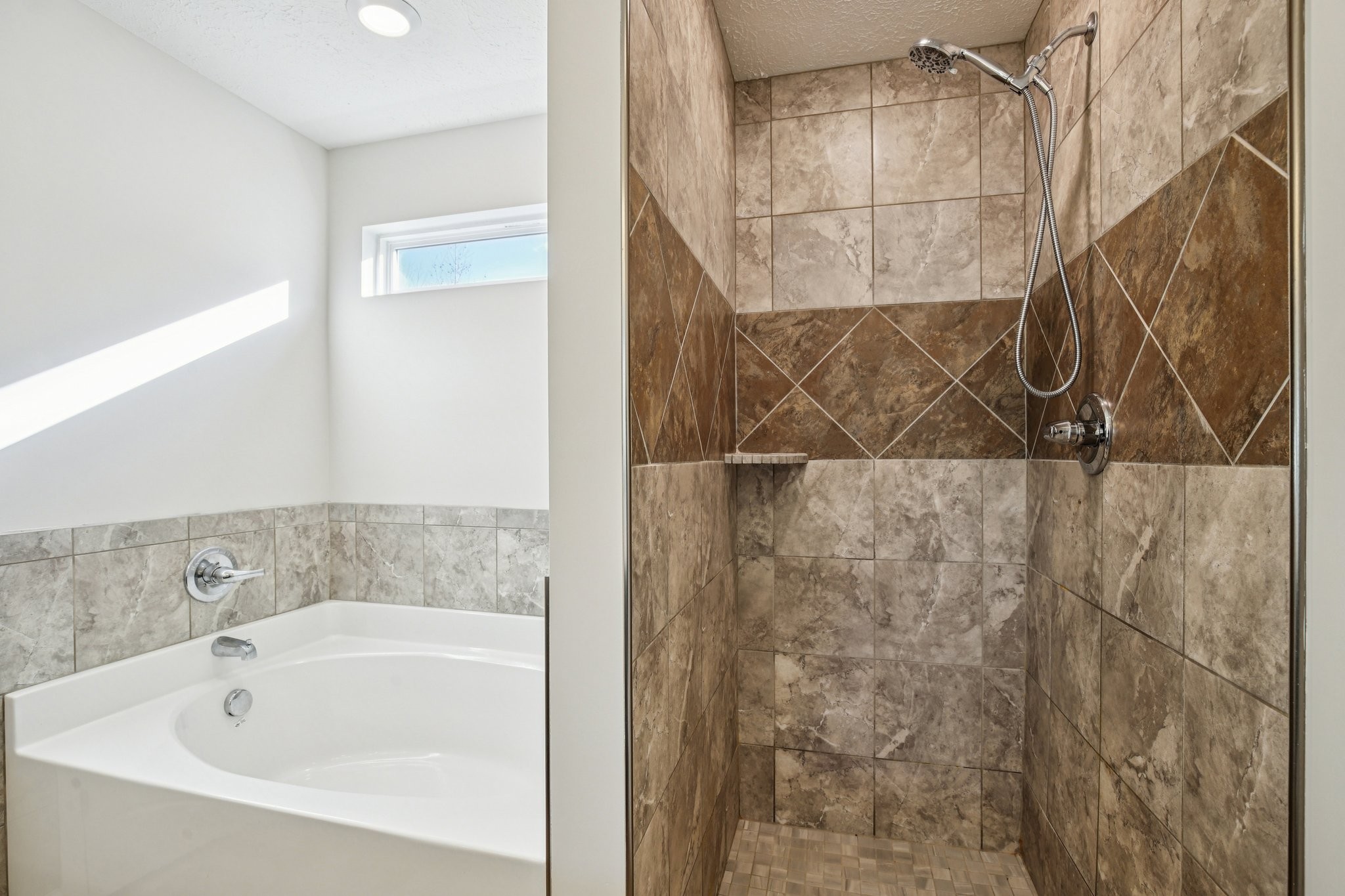 1030 Berra Drive Springfield, TN 37172 - Photo 8 of 13 a bathroom with a bathtub and shower