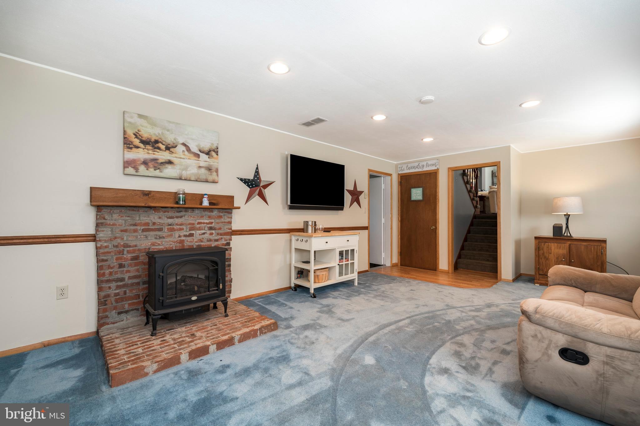 349 Saylors Mill Road Spring City, PA 19475 - Photo 28 of 40 Lower level family room with electric fireplace