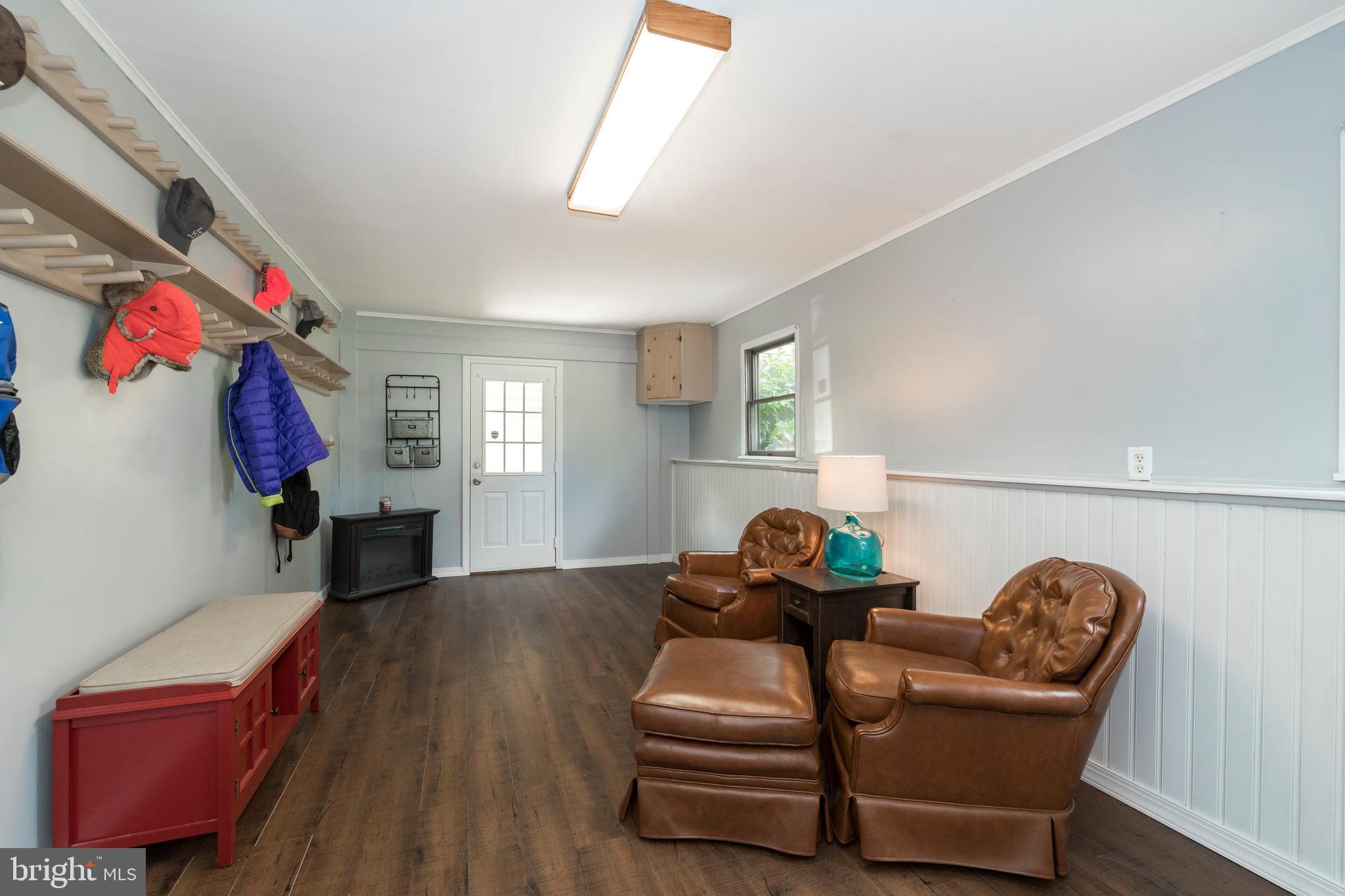 349 Saylors Mill Road Spring City, PA 19475 - Photo 31 of 40 Multi-purpose rm w/coat rack & door to breezeway