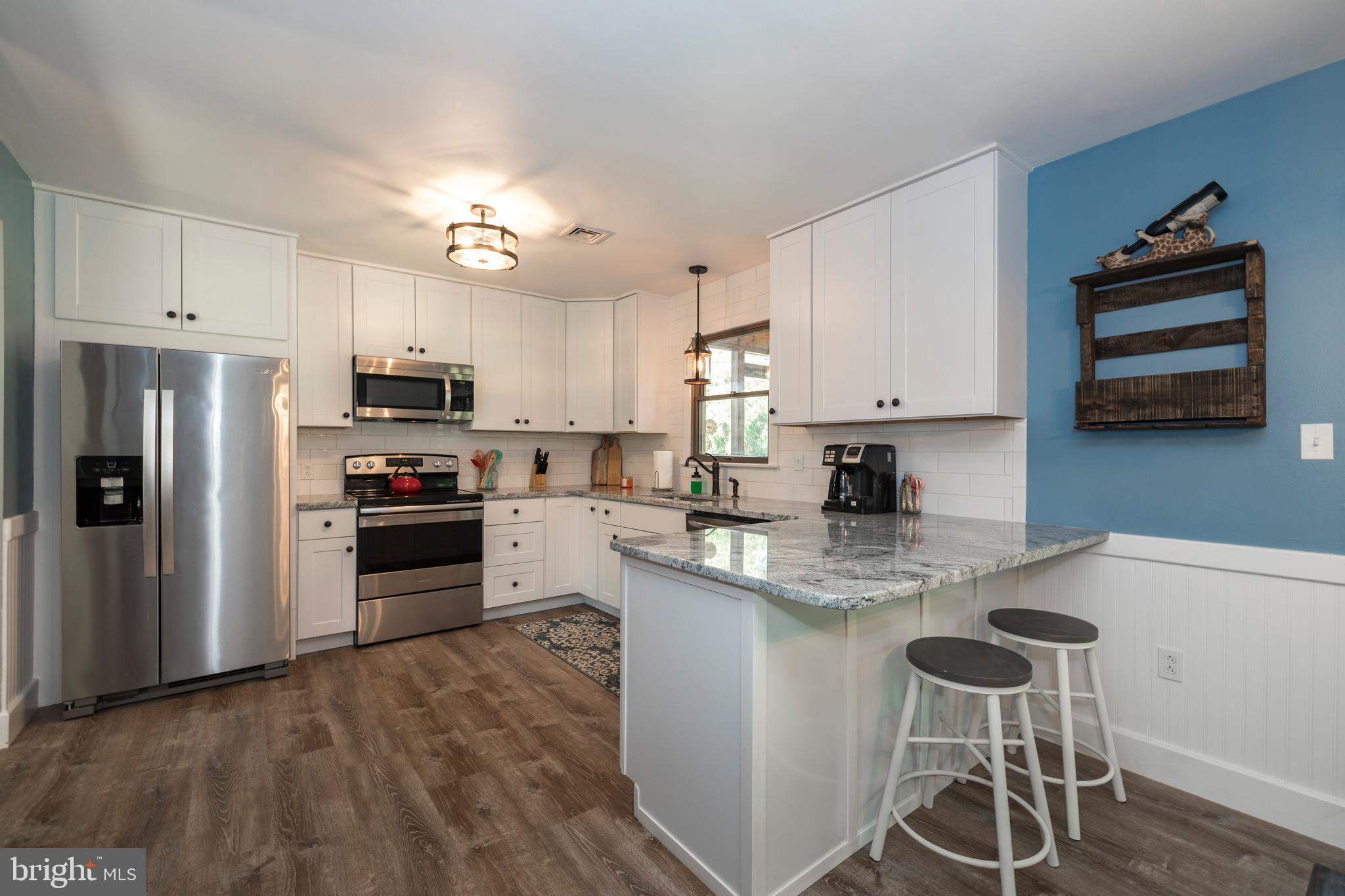 349 Saylors Mill Road Spring City, PA 19475 - Photo 9 of 40 Granite counters and breakfast bar
