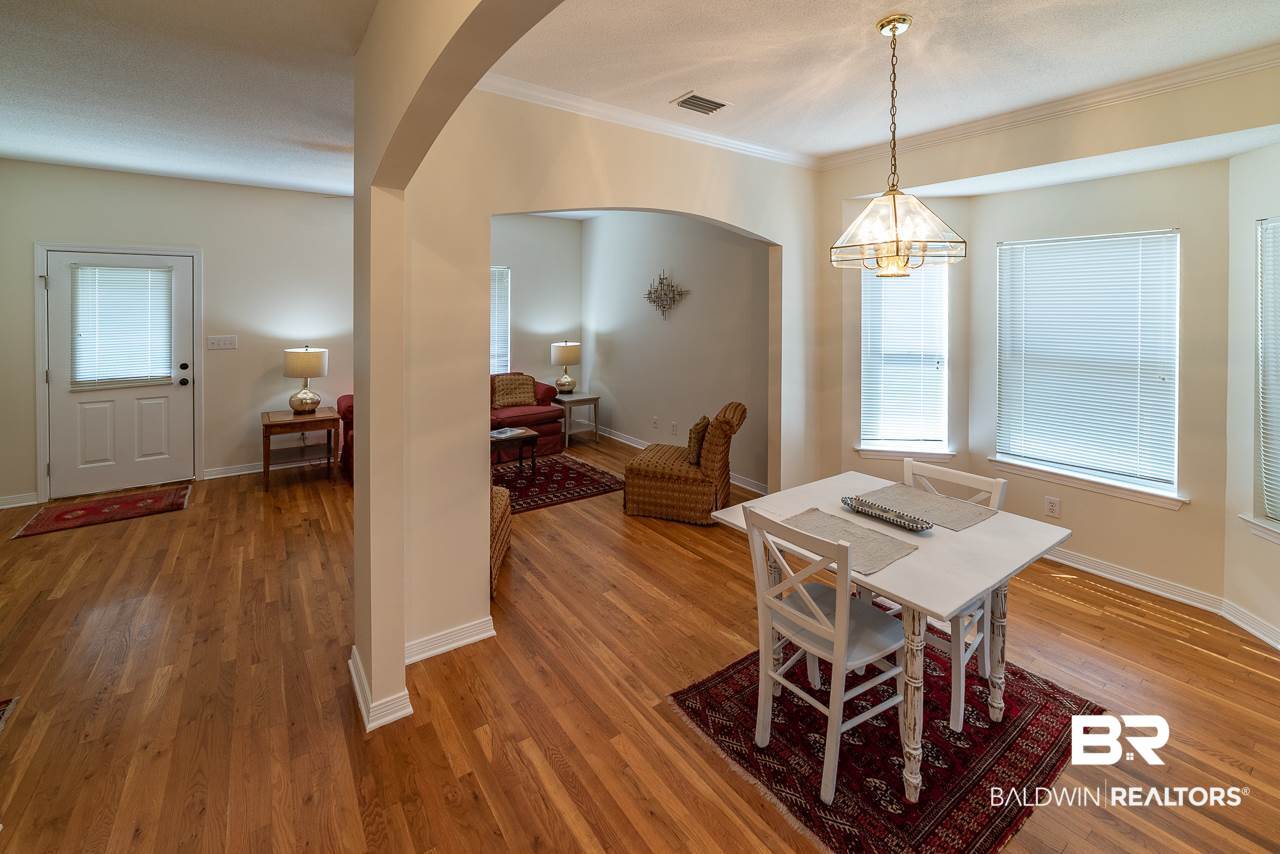 17460 Pandion Ridge, Unit C1 Fairhope, AL 36532 - Photo 6 of 25 Living And Dining Room