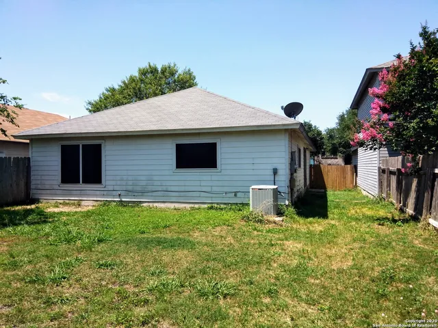 a house view with a garden space