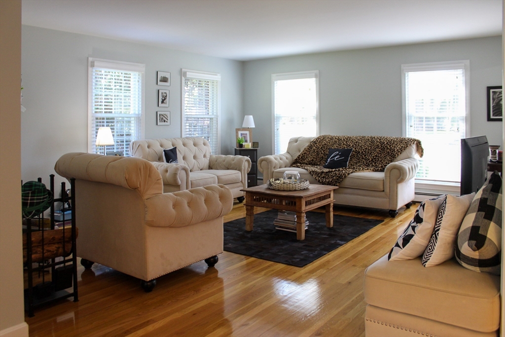 2 Applewood Circle Shrewsbury, MA 01545 - Photo 16 of 40 a living room with furniture or window and a wooden floor