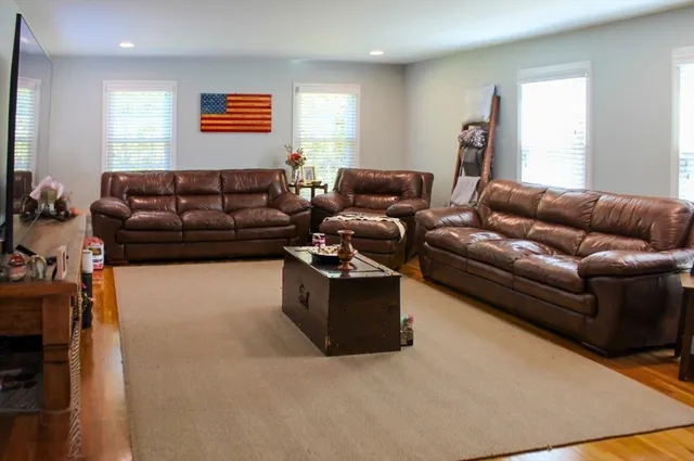 a living room with furniture and a couch