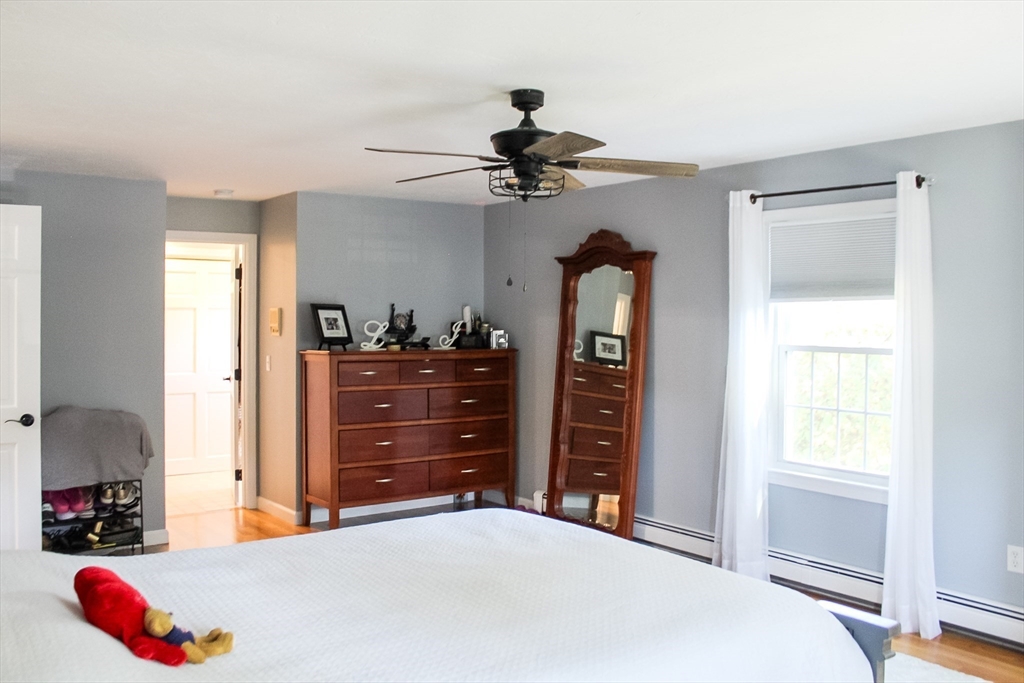 2 Applewood Circle Shrewsbury, MA 01545 - Photo 20 of 40 a bedroom with a bed and a dresser