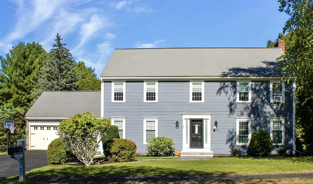 2 Applewood Circle Shrewsbury, MA 01545 - Photo 2 of 40 front view of a house with a garden