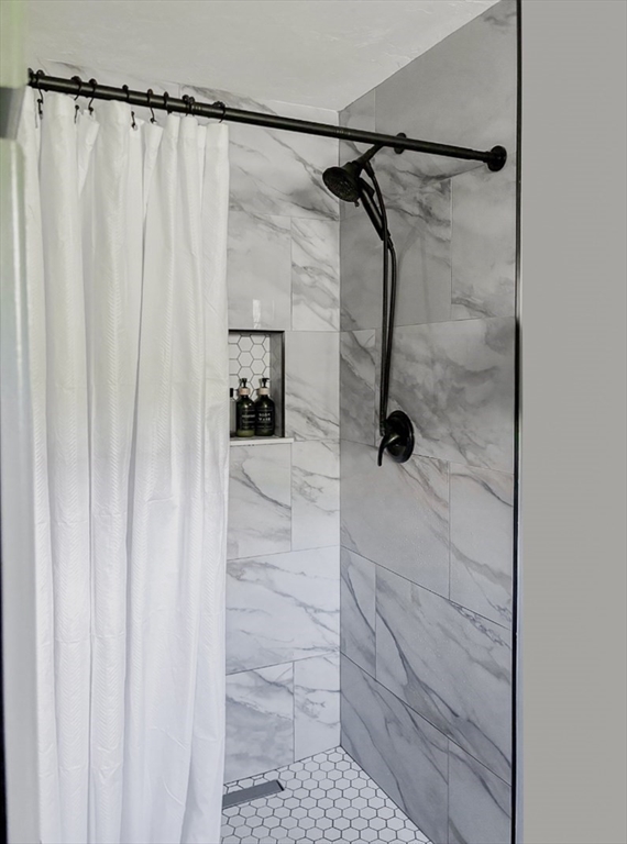 2 Applewood Circle Shrewsbury, MA 01545 - Photo 22 of 40 a bathroom with a shower