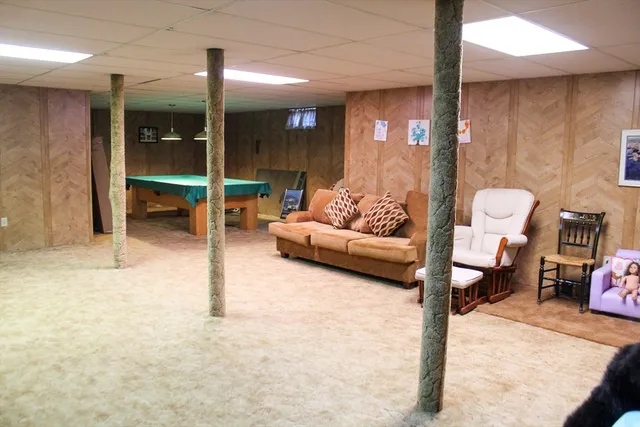 a living room with furniture and a couch