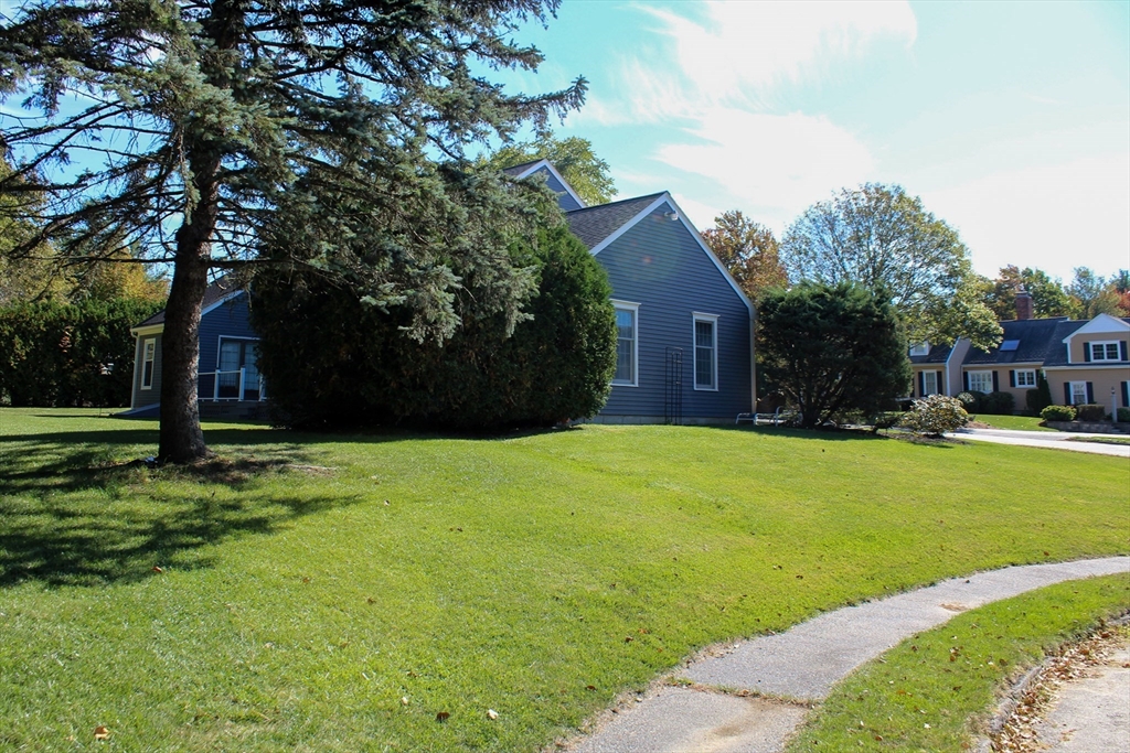 2 Applewood Circle Shrewsbury, MA 01545 - Photo 37 of 40 a front view of a house with a yard