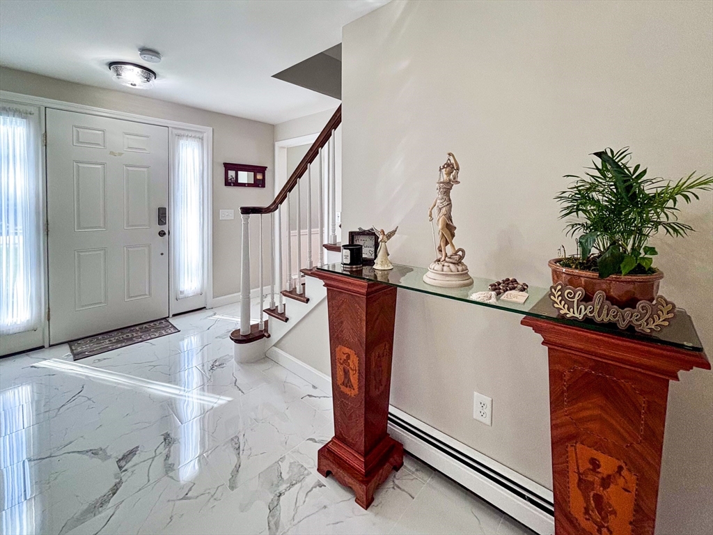 2 Applewood Circle Shrewsbury, MA 01545 - Photo 5 of 40 a kitchen with stainless steel appliances granite countertop a sink and a refrigerator