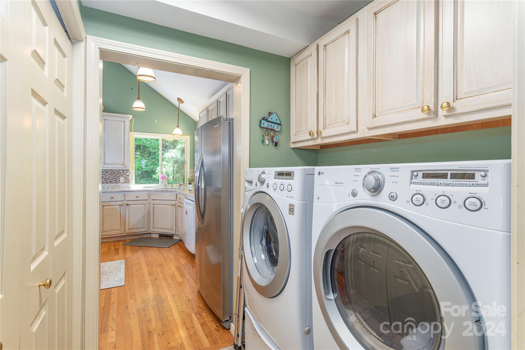 3191 Pigeon Road Waynesville, NC 28786 - Photo 14 of 33 a view of bathroom with washer and dryer