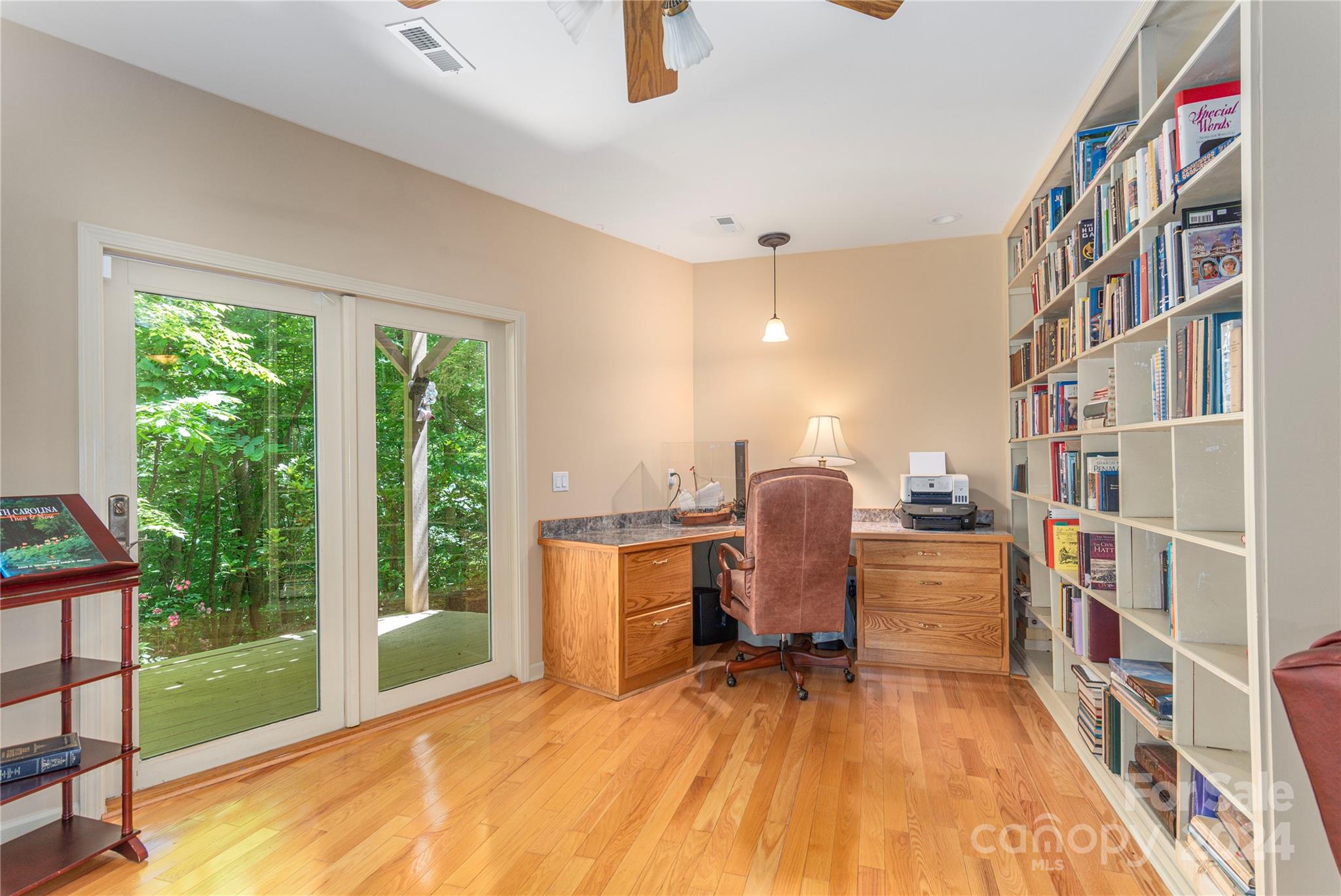 3191 Pigeon Road Waynesville, NC 28786 - Photo 23 of 33 a view of a workspace with furniture and a window