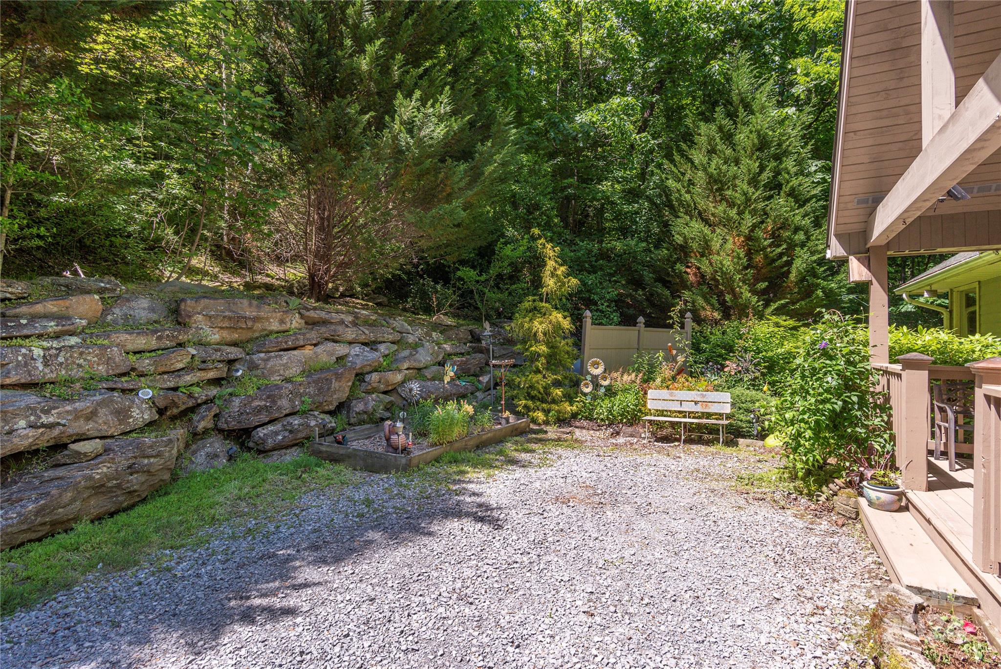 3191 Pigeon Road Waynesville, NC 28786 - Photo 26 of 33 a view of backyard with outdoor seating and green space