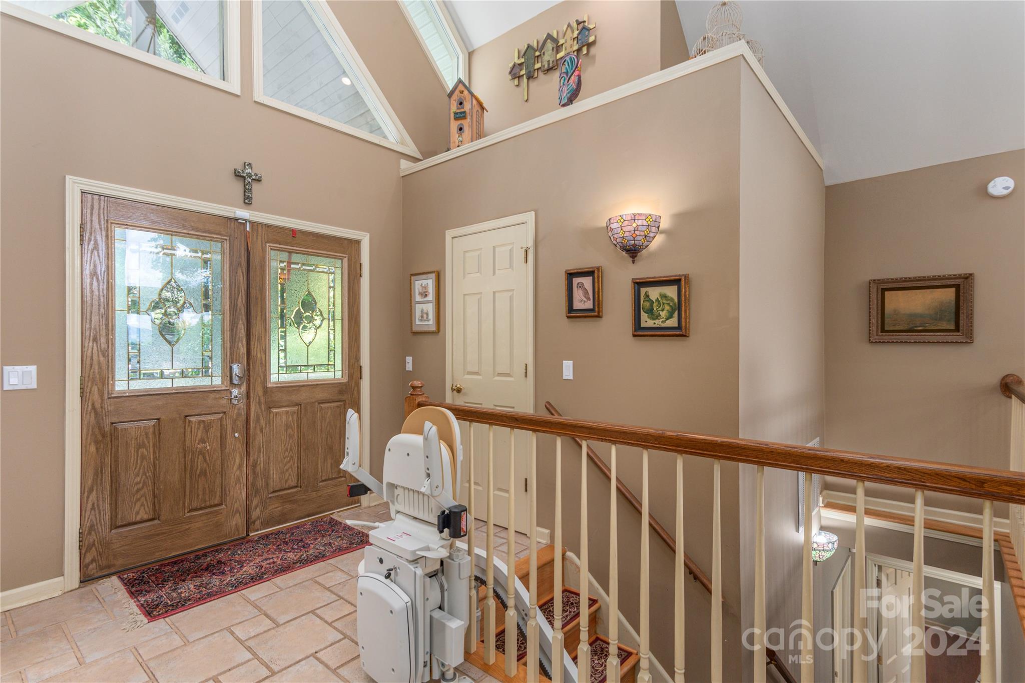 3191 Pigeon Road Waynesville, NC 28786 - Photo 28 of 33 a view of a hallway with wooden floor and windows