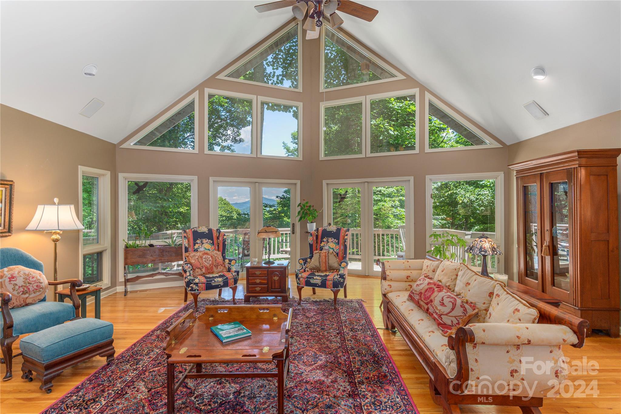 3191 Pigeon Road Waynesville, NC 28786 - Photo 3 of 33 a living room with furniture and a large window