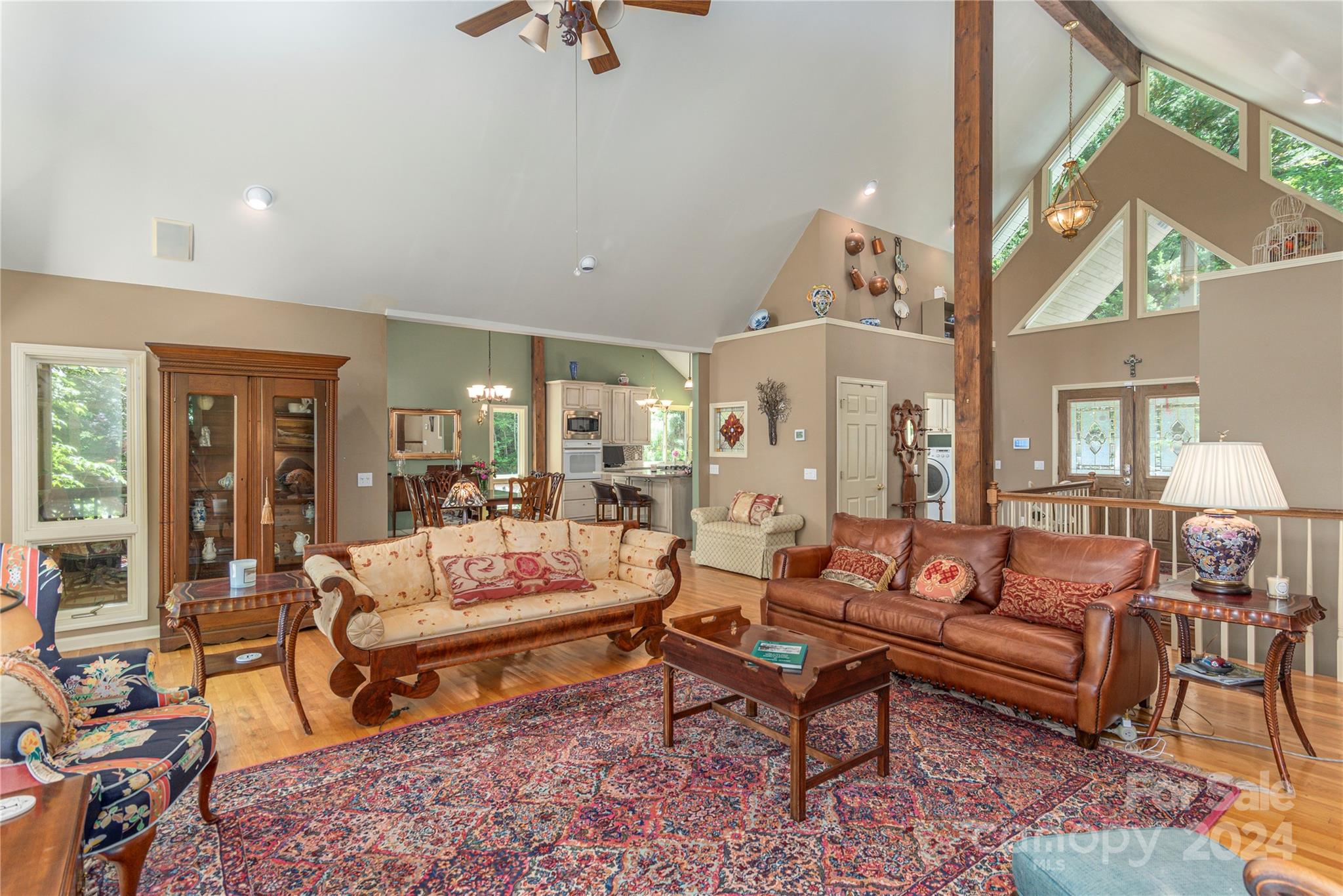 3191 Pigeon Road Waynesville, NC 28786 - Photo 5 of 33 a living room with furniture and a rug
