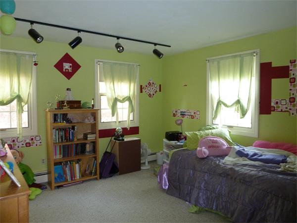 20 Dodge Road Marblehead, MA 01945 - Photo 13 of 16 a bedroom with a bed and a chandelier