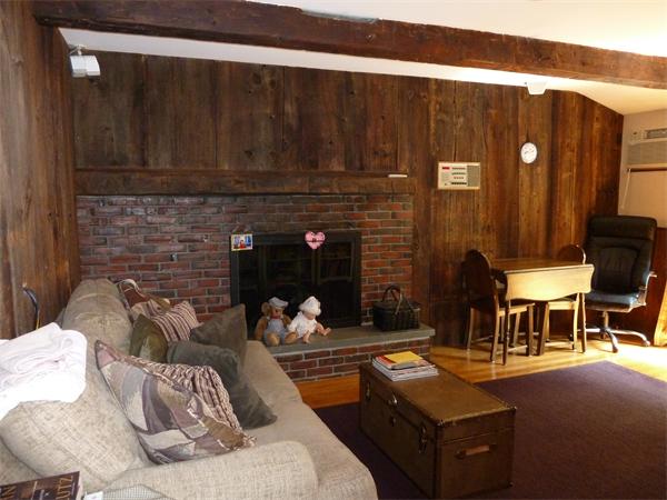 20 Dodge Road Marblehead, MA 01945 - Photo 4 of 16 a living room with furniture and a fireplace