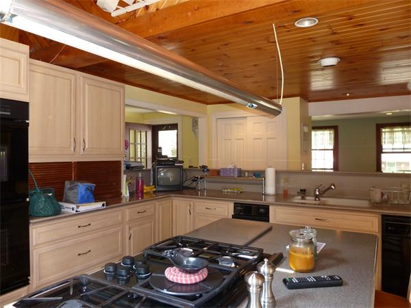 20 Dodge Road Marblehead, MA 01945 - Photo 6 of 16 a kitchen with a stove a sink and cabinets