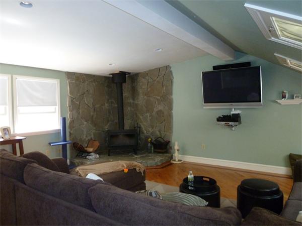 20 Dodge Road Marblehead, MA 01945 - Photo 8 of 16 a living room with furniture and a flat screen tv