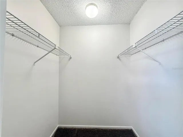 a view of small space with racks on the wall