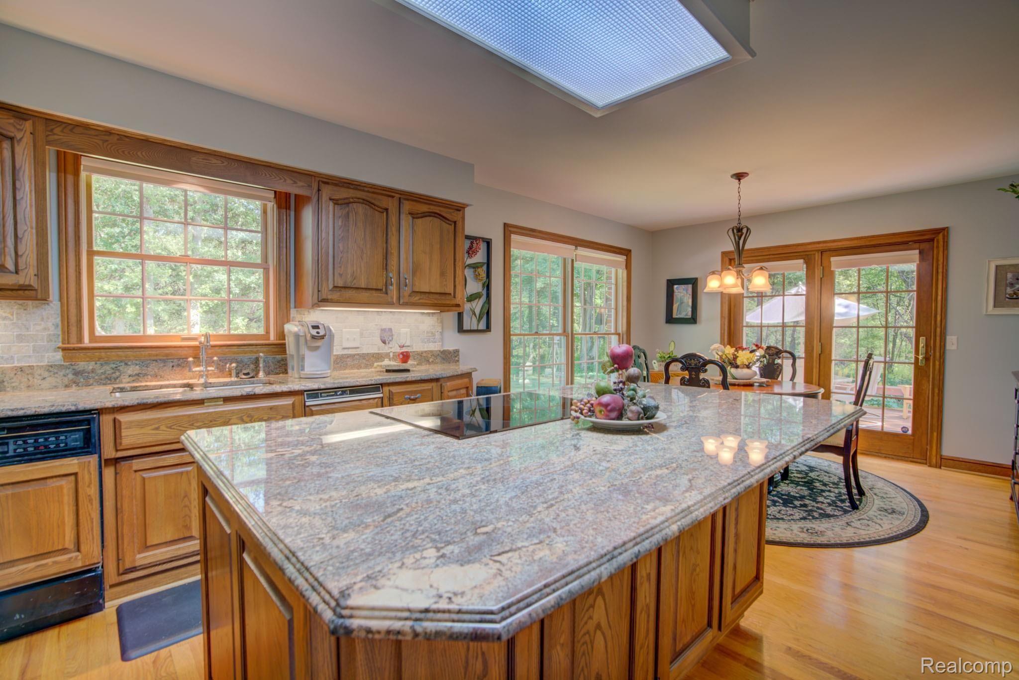 10177 West Mount Morris Road Flushing, MI 48433 - Photo 12 of 53 SPACIOUS KITCHEN HAS PLENTY OF ROOM FOR ENTERTAINING OR FAMILY HOLIDAYS AND GET-TOGETHERS