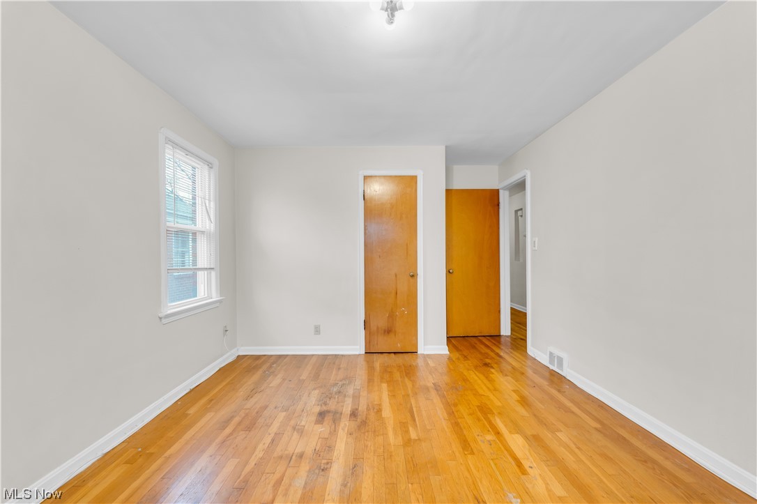 13566 Cedar Road Cleveland, OH 44118 - Photo 38 of 49 Unfurnished room with light wood-type flooring