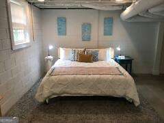 1558 Womack Road Atlanta, GA 30338 - Photo 2 of 19 a bedroom with a bed and window